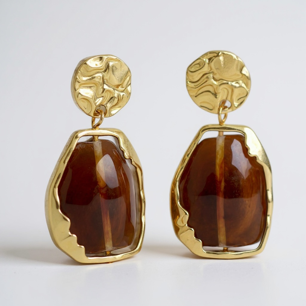 The Aurelia Earrings Golden elegance with a timeless soul.